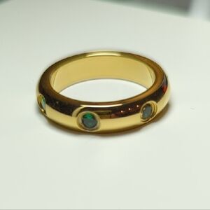 Jewelry Archives - Elegant Gold Ring with Green Accents